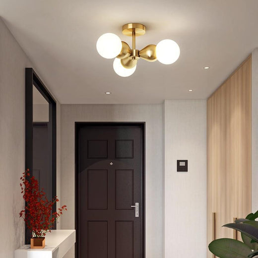 Plafonnier sublime corps en fer de couleur or Malisse