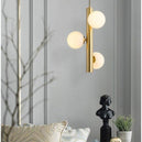 Lampe suspendue circulaire dorée au design sophistiqué