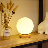 Petite lampe de chevet base en bois ronde