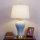 Lampe de table au corps en céramique bleu clair